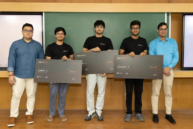 Prize cheques on stage for the winners