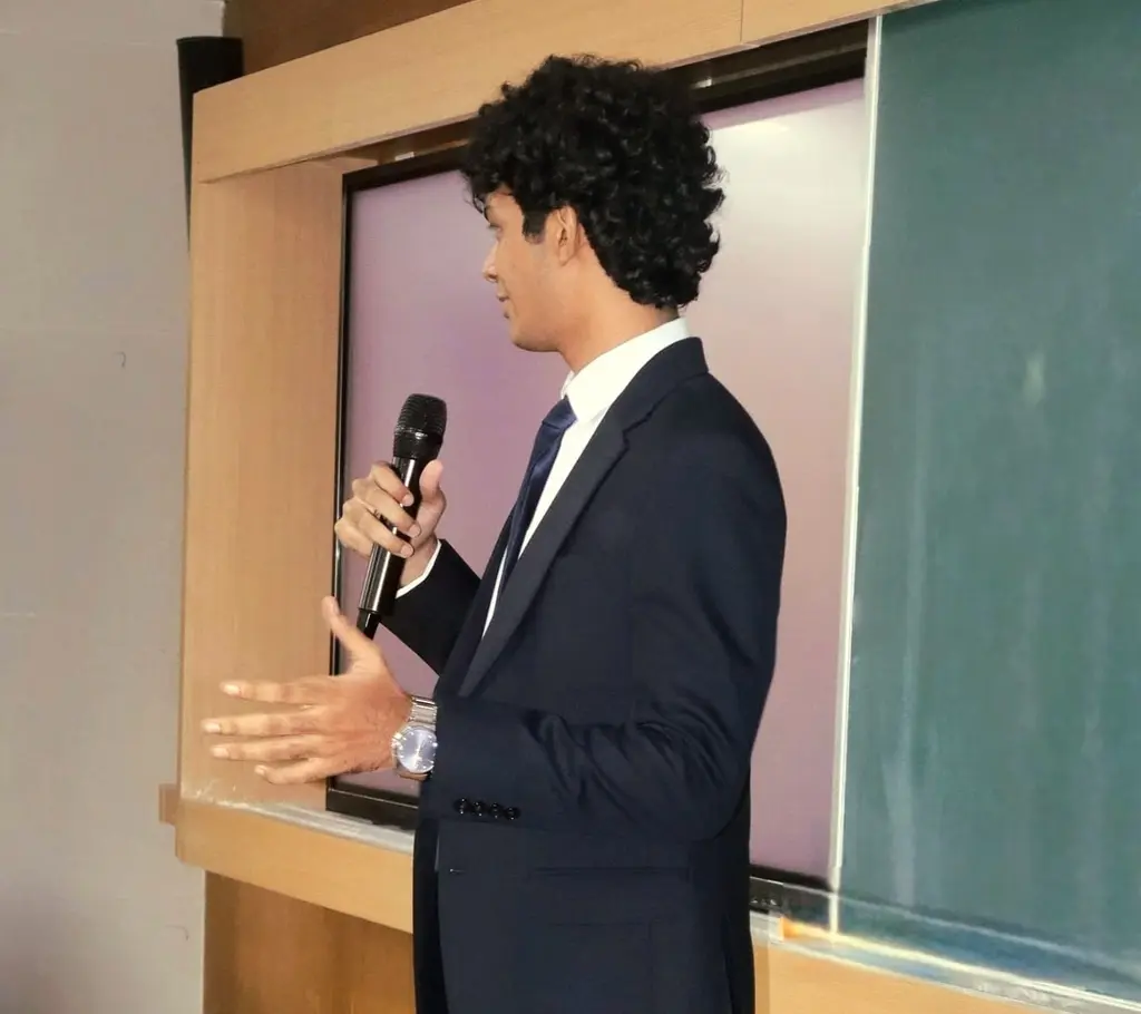 Tilak addressing participants at the Derive finals